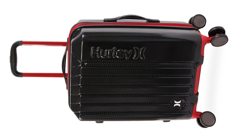 A black and red Hurley Wave Carry-On Spinner suitcase