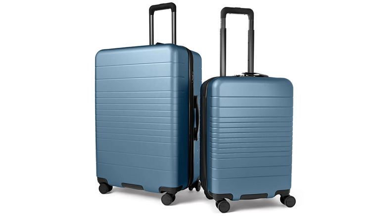 A two-Piece Hardside Luggage Set in blue, with one larger and one smaller bag