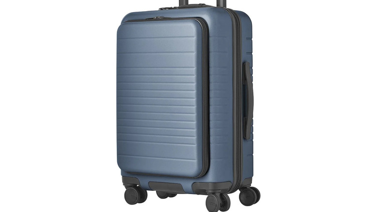 A light blue Hardside Carry-on Pro Spinner Suitcase With USB