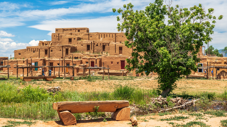 Adobe structures stand in Taos, New Mexico