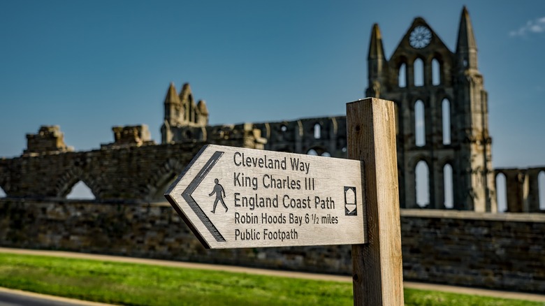 Wooden sign for Cleveland Way King Charles path