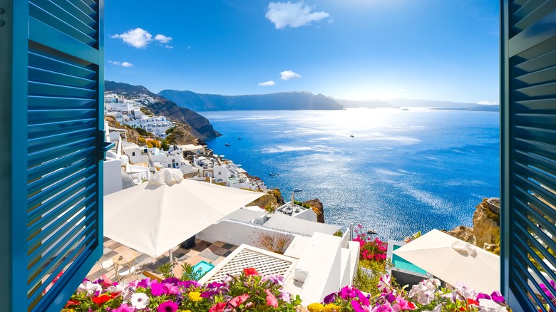 Window view of village and ocean