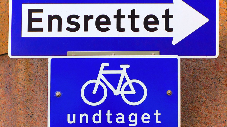 Road sign written in Danish: one-way, except bike, Copenhagen, Denmark.