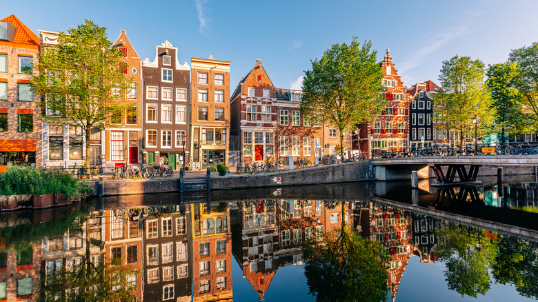 View of houses in Amsterdam as seen from the far side of a canal