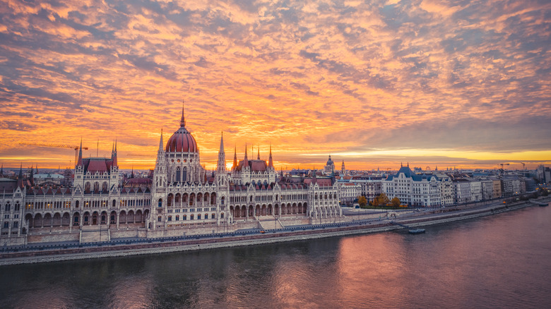 Sunrise at The Parliament building, reflection on the River Danube in the Hungarian capital, Budapest