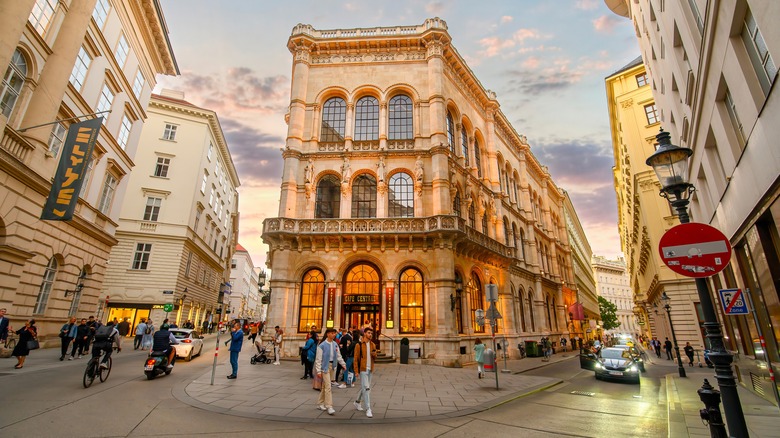 People milling around outside the famous Cafe Central in Vienna