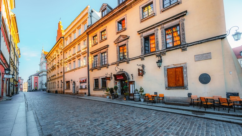 Empty, cobbled street in Warsaw old city center near Vistula river in Poland
