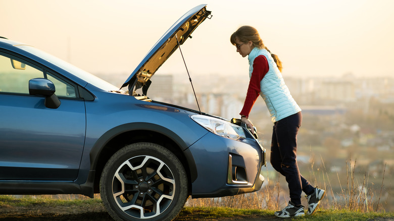 woman with car trouble