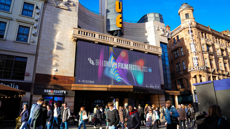 View of a busy London street with a banner announcing the film festival