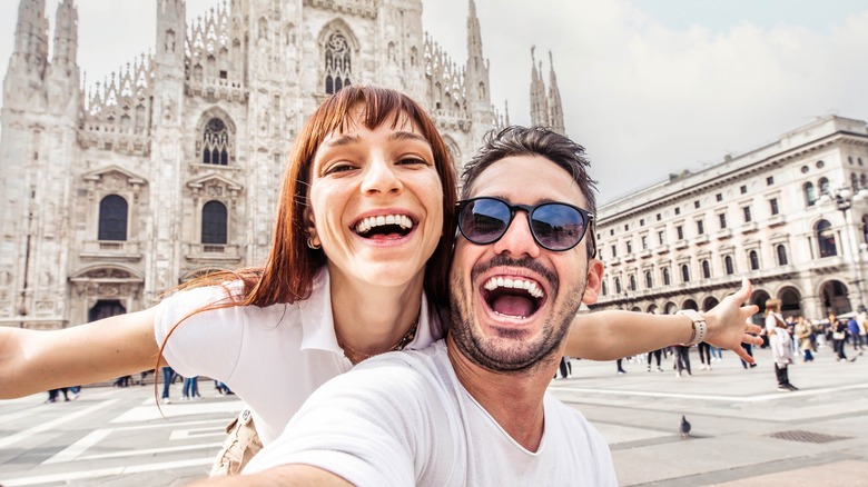 Happy traveler couple