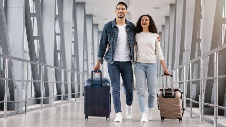 Happy couple in airport