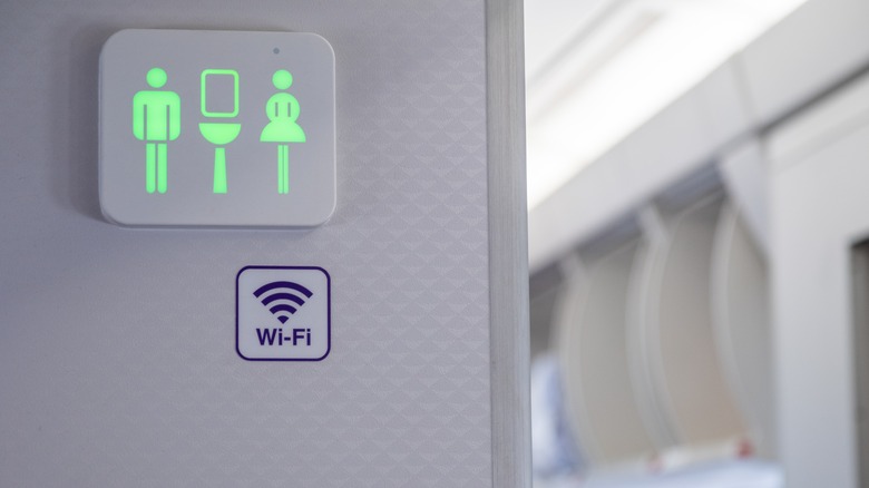 Toilet sign on a plane