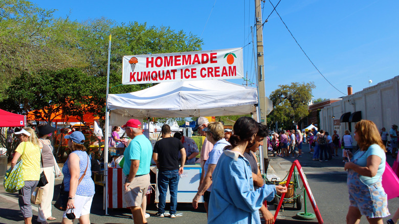 crowd of people at Kumquat ice cream stand during Kumquat Festival