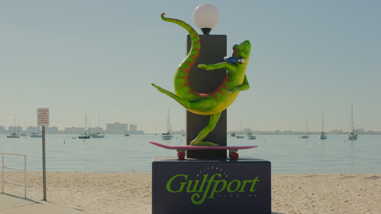 A lizard on a skateboard in Gulfport