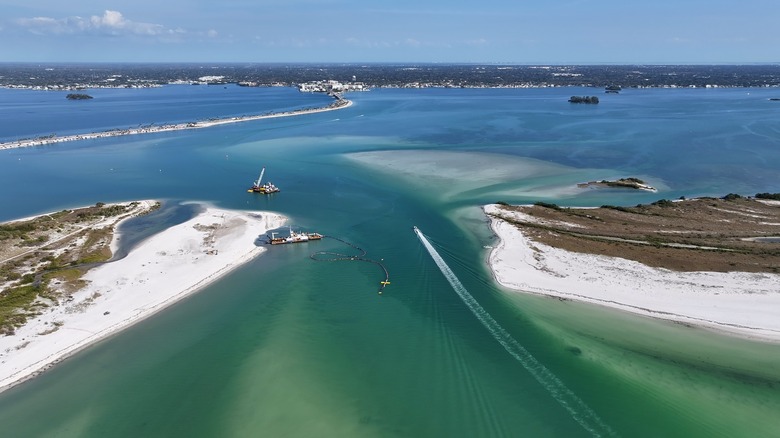 Aerial view of two islands with water flowing in between
