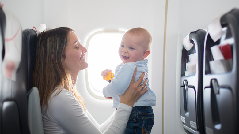Woman and baby on plane