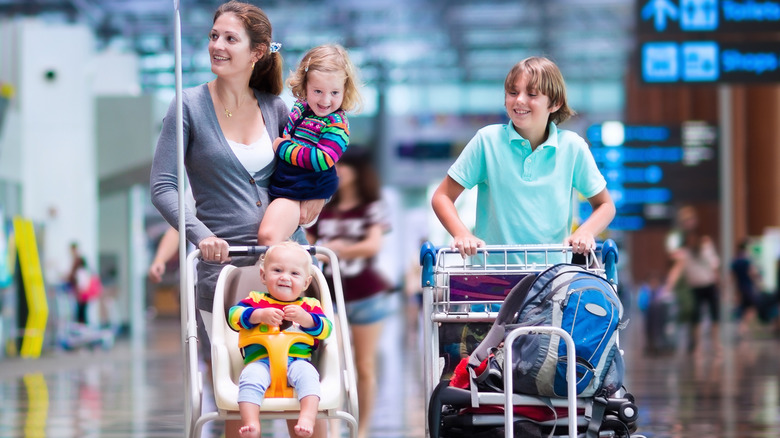 Family with stroller at airport