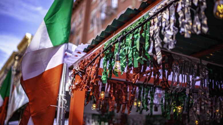 Festive Italian flags decorate a shop.