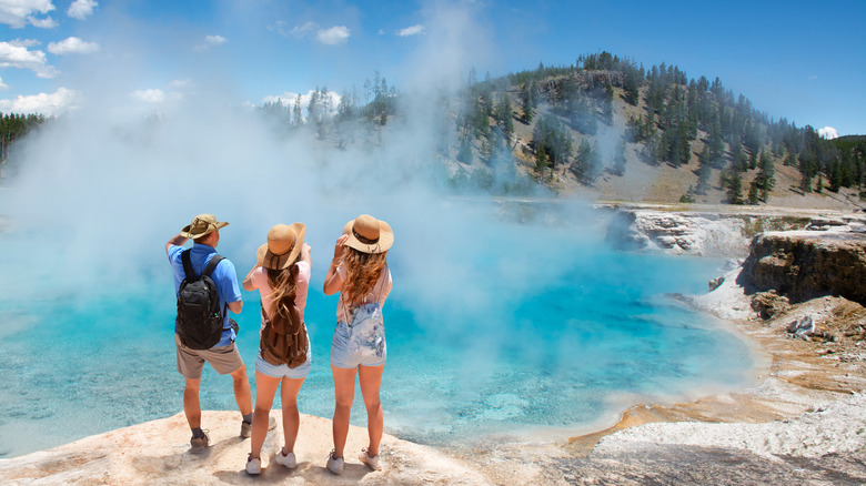 Family exploring Yellowstone National Park