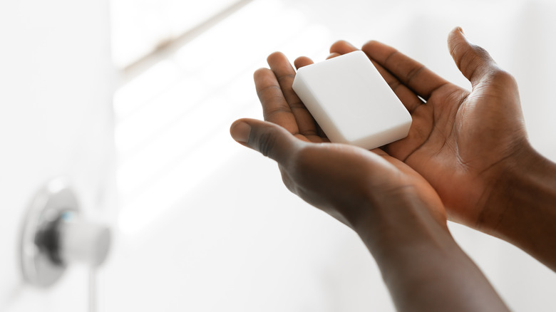 Person holding soap