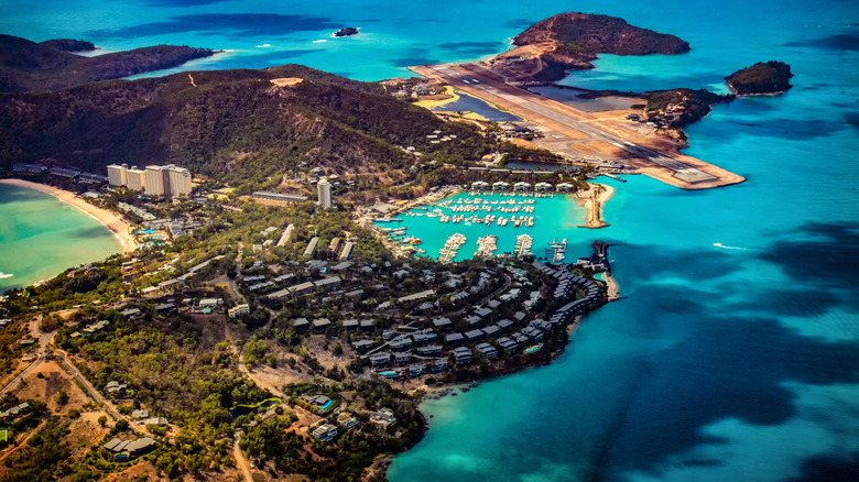 a view over Hamilton Island showing the marina, airport, and Catseye Beach