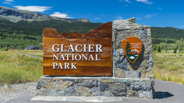 the entrance to Glacier National Park, with the Rocky Mountains in the background, in Montana