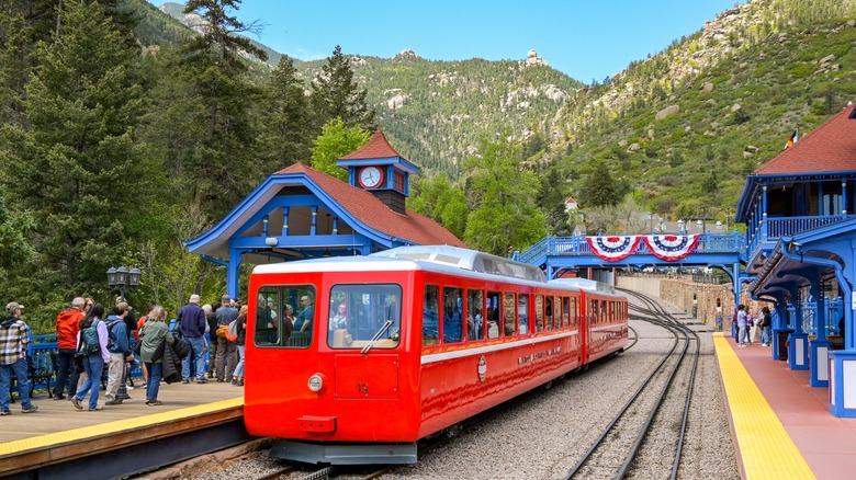 In Manitou, Pikes Peak Cog Railway train gets ready to start its journey
