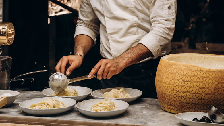 An Italian chef preparing pasta