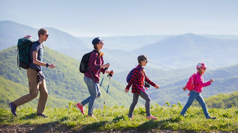 Family with children hiking