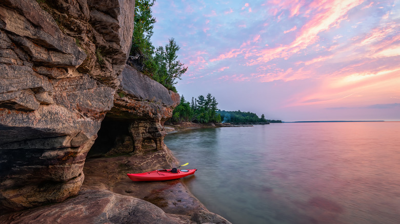 kayak by lakeside rock formation