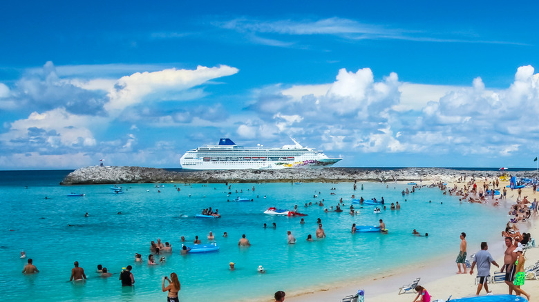 tourists on beach Great Stirrup Cay