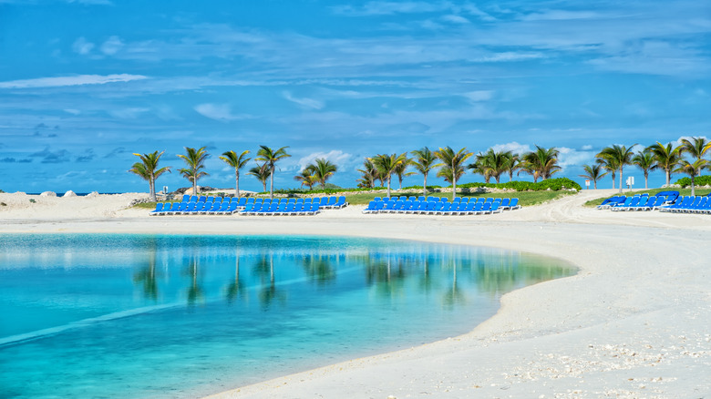 Pristine Great Stirrup Cay with empty beach chairs