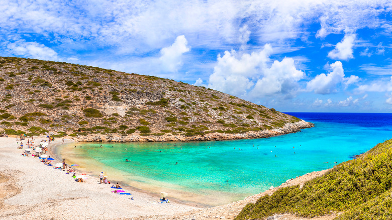 A remote cove beach with blue-green water