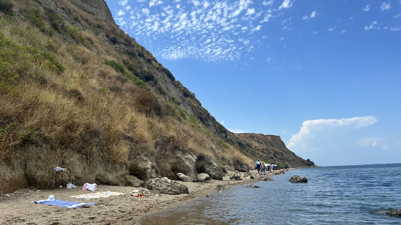 Small beach alcove with towels