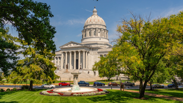 the high dome of Missouri State Capitol amongst parkland in Jefferson City Missouri