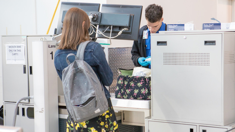 Traveler going through the TSA