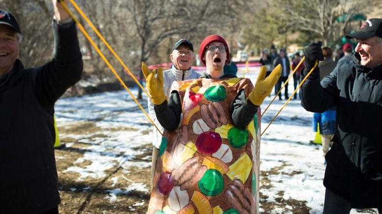man in fruitcake costume 