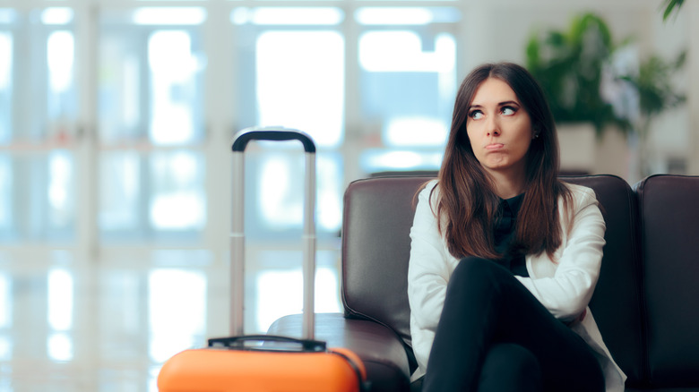 unhappy traveler