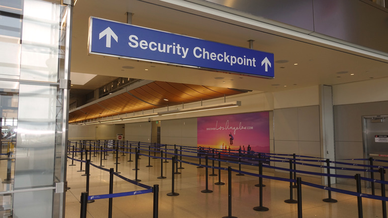 Security Checkpoint sign in airport