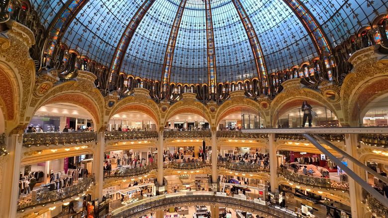 A domed stained-glass roof in a luxury department store in Paris