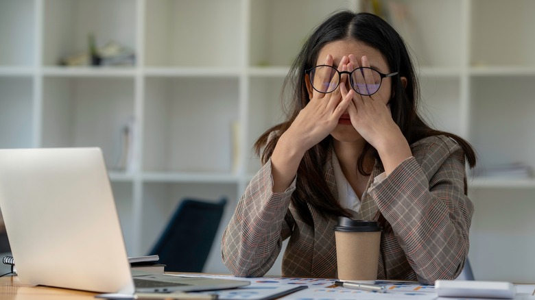 woman frustrated at desk