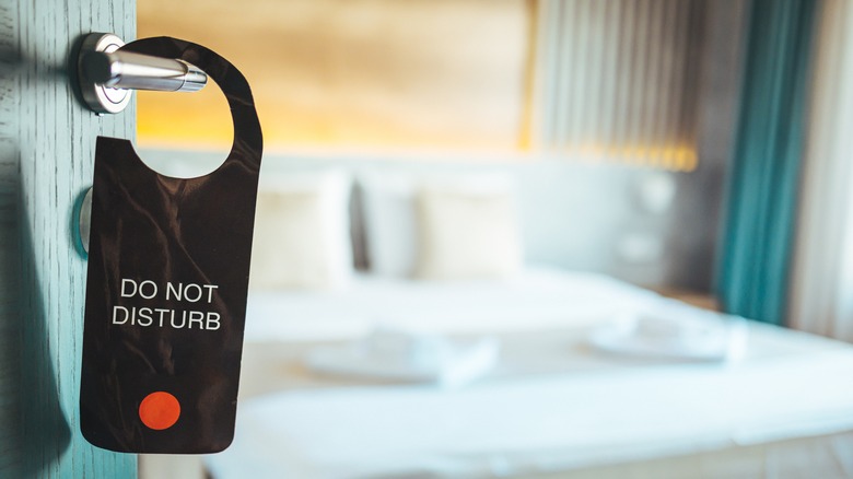 "do not disturb" hotel sign