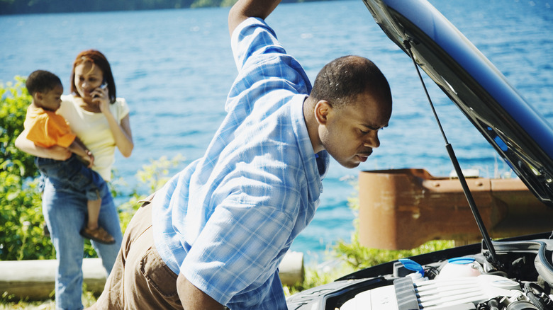 family receiving roadside assistance