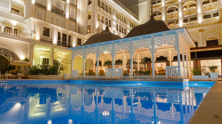 The pool and outdoor patio of an all-inclusive hotel in Turkey.