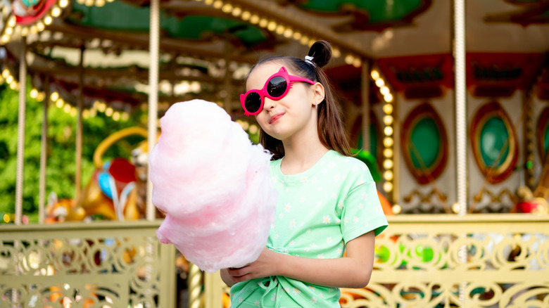 Child with cotton candy