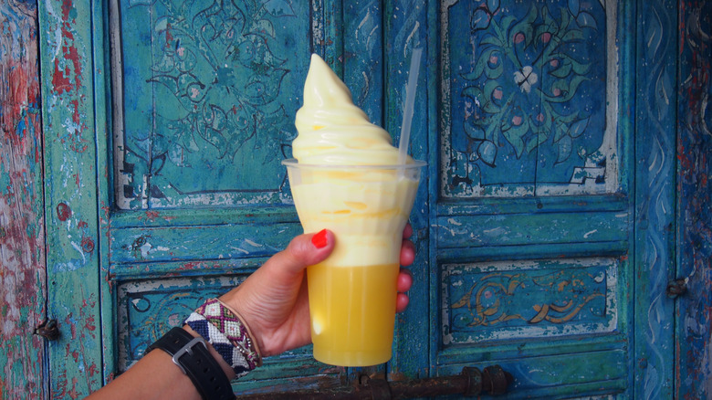A person holding a Dole Whip