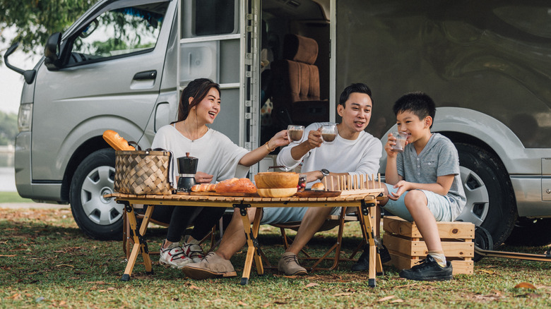 family in an RV camping