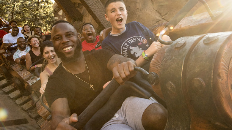 Park-goers on Seven Dwarfs ride