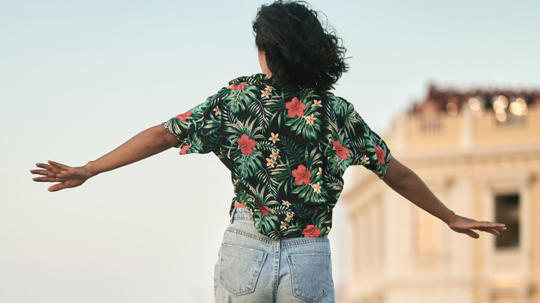 Person from behind wearing floral top