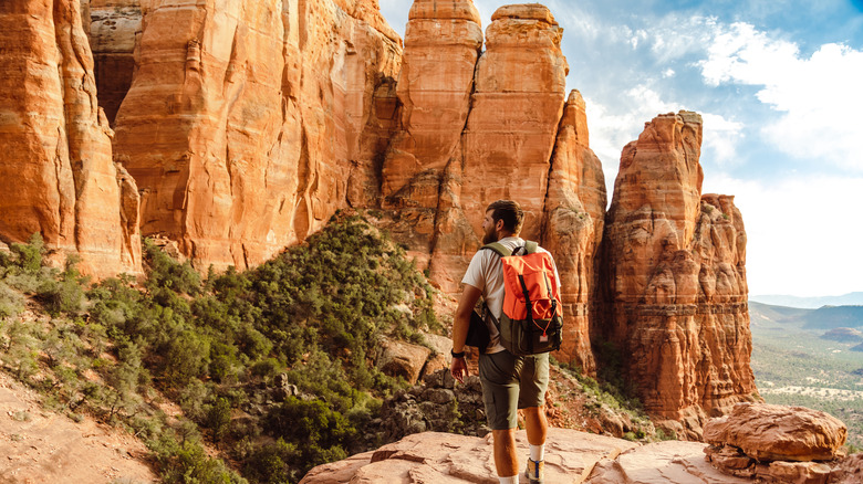 man hiking in desert